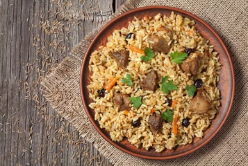 Aluminium Prints meal dishes Arabic national rice food called pilaf cooked with fried meat