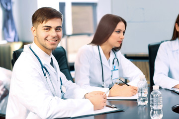 Medical workers working in conference room