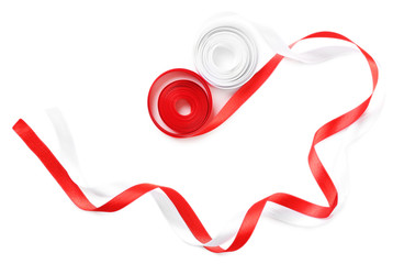 Colorful red and white ribbons isolated on white