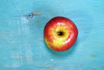 apple ob blue wood background