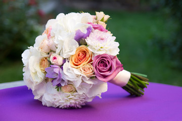 White and purple wedding bouquet