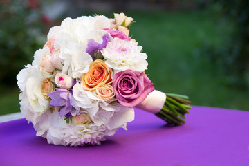 White and purple wedding bouquet
