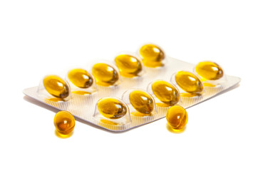 Fish oil supplement product capsules with foil panel isolated on