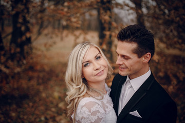 bride walking in golden autumn nature