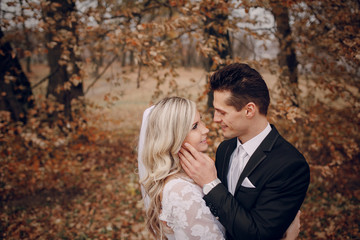 bride walking in golden autumn nature