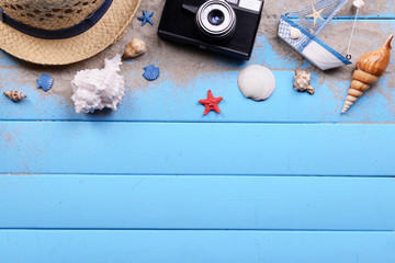Fototapeta na wymiar Travel accessories on wooden background