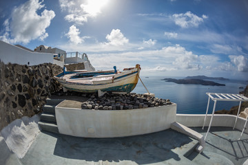 Old boat on the island of Santorini, Greece