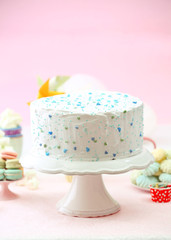 Birthday decorated cake on color background