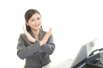 禁止の意思表示をするOL