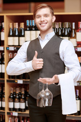Sommelier with a tray and glasses