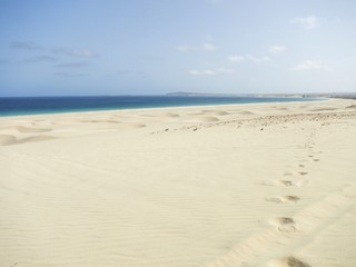 Wide beach with high sand dunes