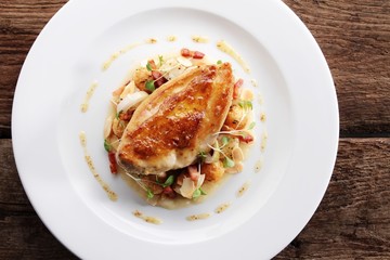 pan fried chicken breast plated main meal