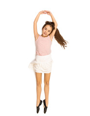 Isolated shot of happy cute girl lying on floor and dancing ball