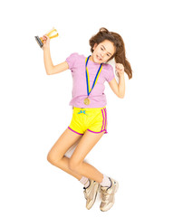 Isolated shot of happy girl jumping with trophy cup and gold med