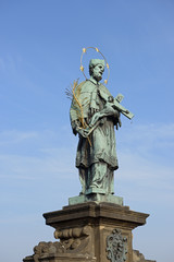 St. John of Nepomuk statue on Charles Bridge in Prague.