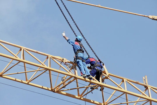 Workers on the crane