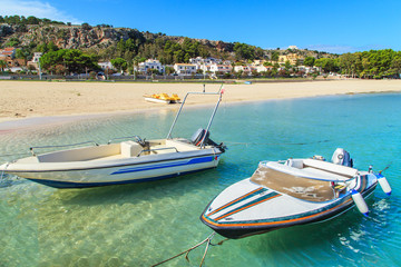 Fototapeta na wymiar Boats in a port in San Vito Lo Capo, Sicily, Italy