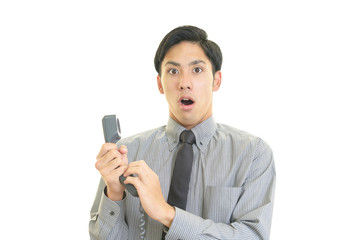 驚いた表情のビジネスマン