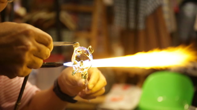 Unidentified Thai artist in blowing glass activity