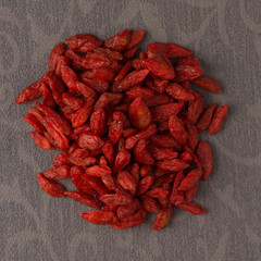 Circle of dry red goji berries
