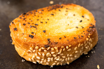 Grilled baguette with seeds