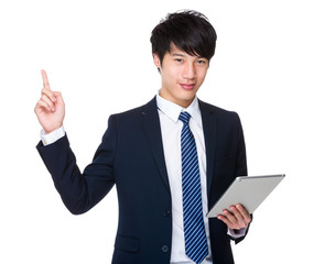 Asian businessman with tablet pc and finger point up