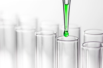 Pipette with drop of liquid