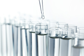 Pipette with drop of liquid