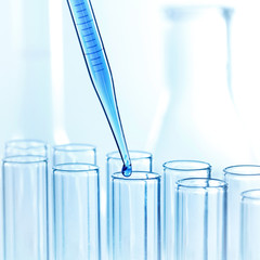 Pipette with drop of liquid