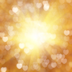Golden heart symbol texture bokeh