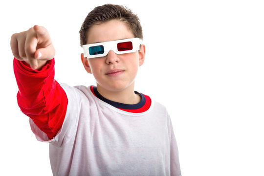 Caucasian smooth-skinned boy wears 3D glasses and points looking