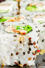 rolls with sesame seeds close up vertical picture
