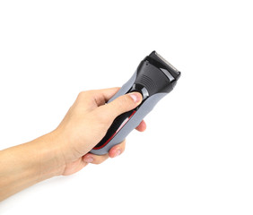 hand with electric shaver