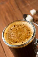 cup of coffee on wood