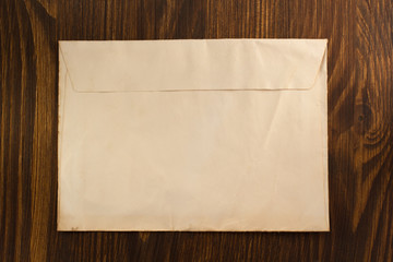 old envelope on wood