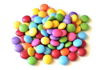 Papier Peint photo Bonbons Isolated colored smarties on white background