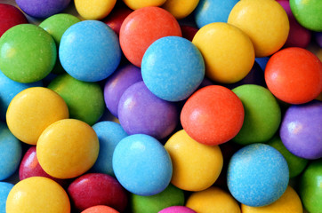Fototapeta na wymiar Macro detail of pile of colored smarties