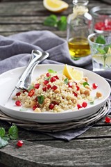 Quinoa salad with chickpea and pomegranate.Healthy eating.