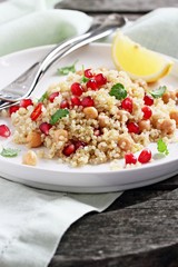 Quinoa salad with chickpea and pomegranate.Healthy eating.