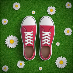 Vintage sneakers standing on green grass