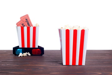 popcorn movie tickets 3 d glasses side view of insulation