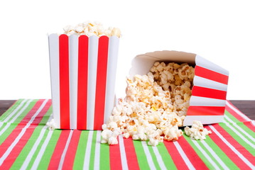 popcorn in a pot on the table isolated on white background