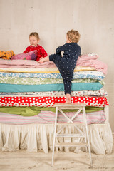 Children on the bed - Princess and the Pea.
