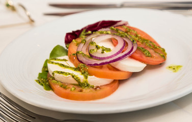 Caprese Salad with Onion and Pesto