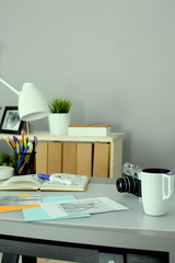 Designer's table with notes and tools