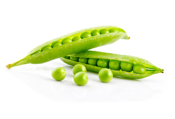 Fresh green pea pods and seeds isolated on white