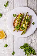 Bruschetta with goat cheese and grilled asparagus