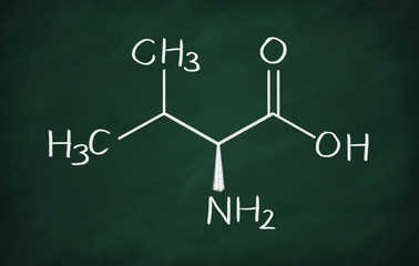 Chemical formula of Valine on a blackboard