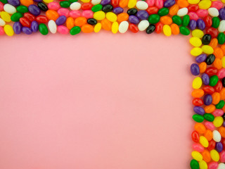 Obraz premium Jelly Beand Frame and Background (Pink Background)