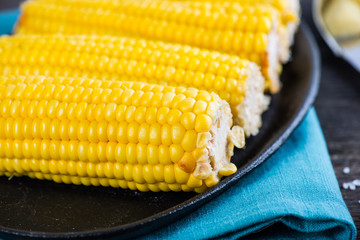 Homemade golden corn cob with butter and salt